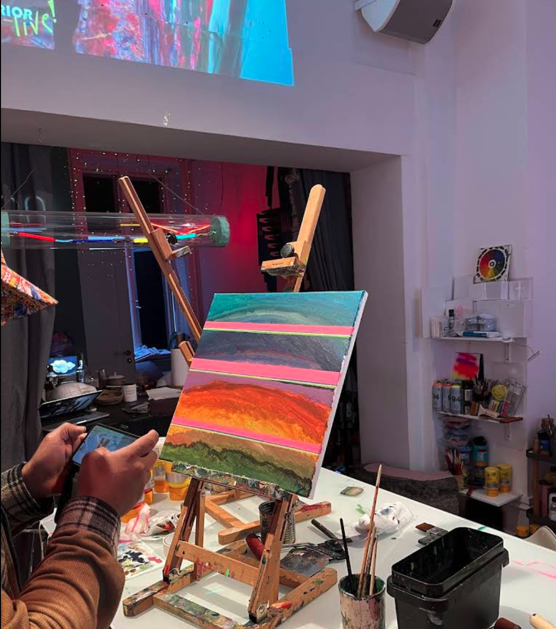 Canvas, easels, projection and painting tools inside BIEN Contemporary